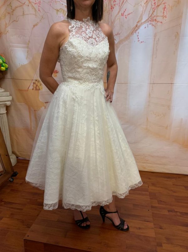 Off White Tea-length Wedding Dress Theron's Fashion and Bridal Boutique