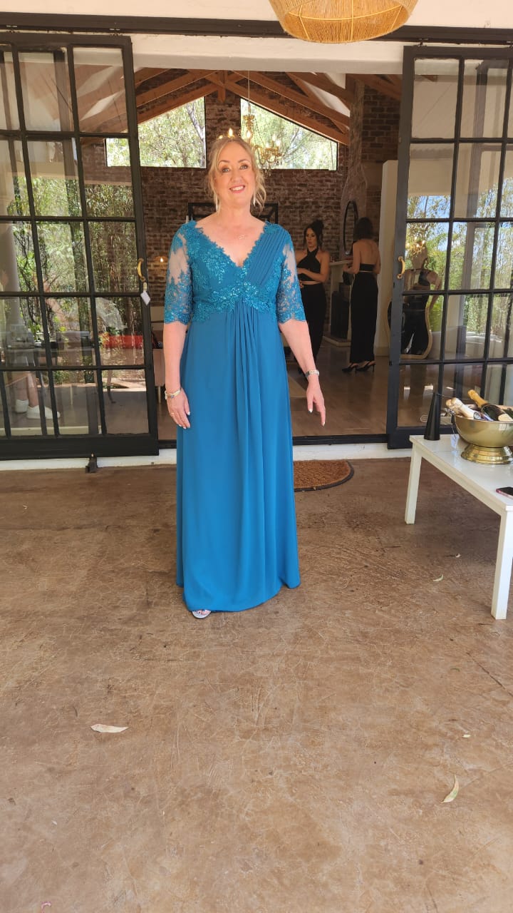 WhatsApp Image 2023 12 10 at 11.29.51 97d338b9 Theron's Fashion & Bridal Boutique